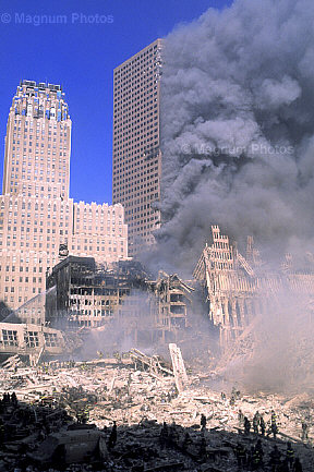 WTC-7 smoking but up; WTC-6 left not on fire, remnants of WTC-1 standing right